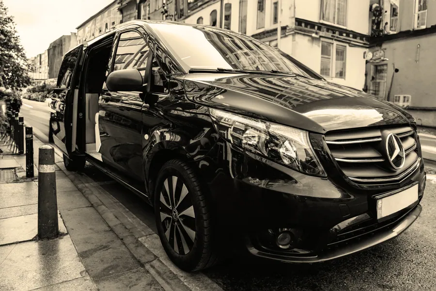 Black Mercedes-Benz V-Class van.